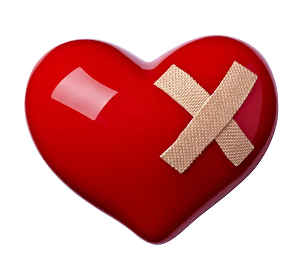 Forma do coração amor bandagem ferida — Fotografia de Stock