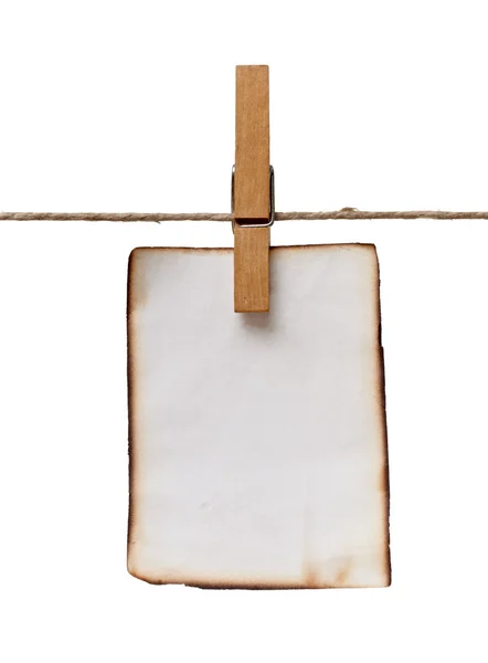 Clothes peg and note paper on clothes line rope — Stock Photo, Image
