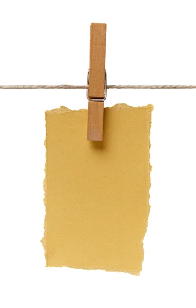 Clothes peg and note paper on clothes line rope — Stock Photo, Image