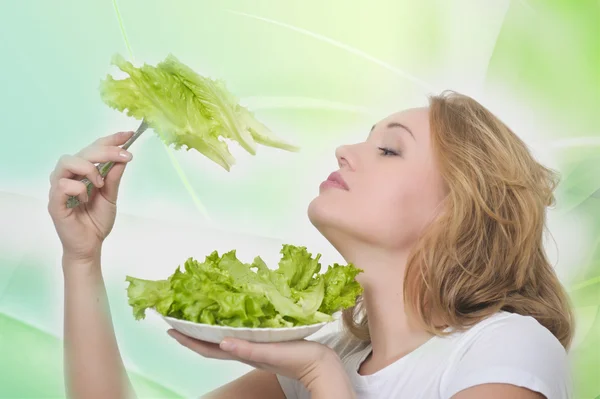 Girl and salad leafs — Stock Photo, Image