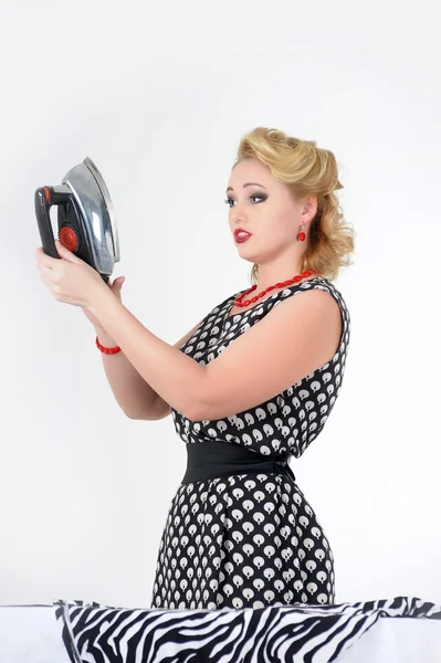 The housewife with the iron — Stock Photo, Image