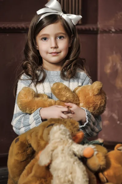 Girl with a teddy bear — Stock Photo, Image