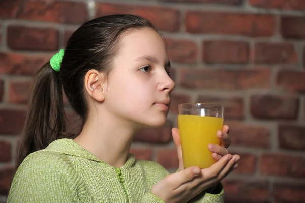 Stock image Teen girl with orange juice