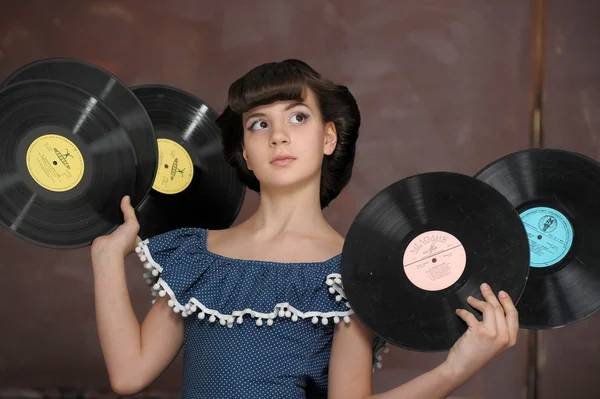 The girl with vinyl records — Stock Photo, Image