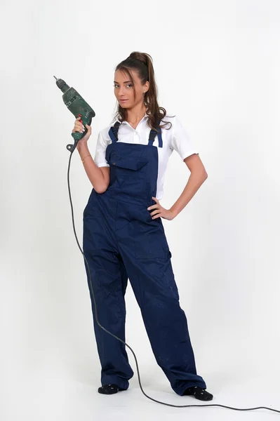 Closeup of a beauty girl with drill — Stock Photo, Image