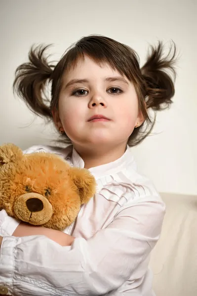 Girl with toy bear cubs — Stock Photo, Image