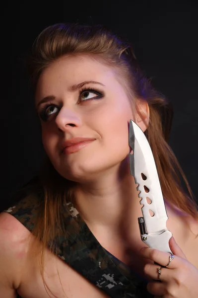 Woman with military knife portrait — Stock Photo, Image