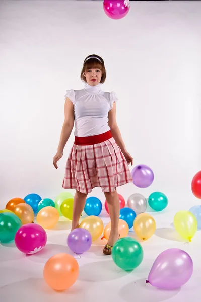 Roztomilá mladá dívka s balónky — Stock fotografie