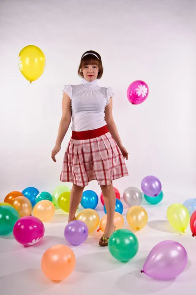 Linda chica joven con globos — Foto de Stock