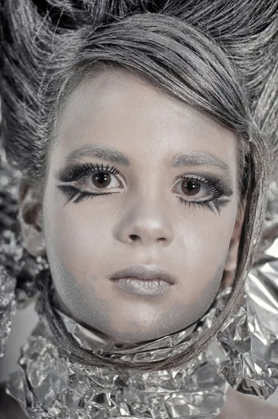 Girl in silver and foil — Stock Photo, Image