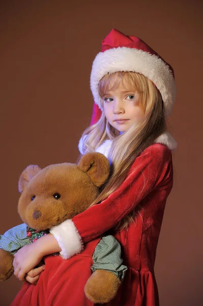 Χριστούγεννα παιδί με αρκουδάκι — Φωτογραφία Αρχείου
