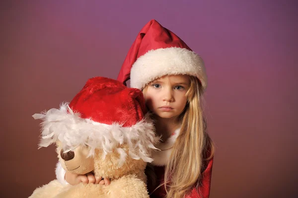 Kerstmis kind met teddy bear — Stockfoto