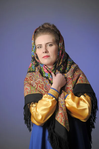 Russian woman in a scarf — Stock Photo, Image