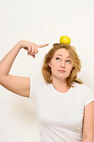 Making balancing with an apple — Stock Photo, Image
