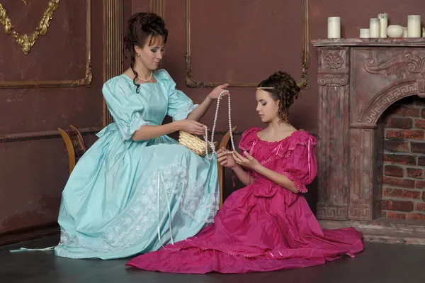 stock image Two ladies in medieval dresses