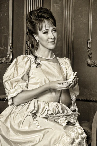 stock image The young woman in an ancient dress