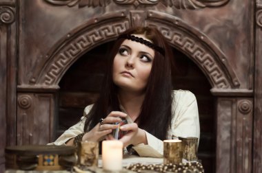 Fortune-teller with tarot cards clipart