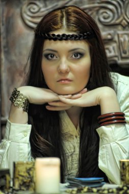 Fortune-teller with tarot cards clipart