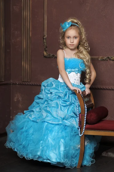 Little girl in a smart blue dress — Stock Photo, Image