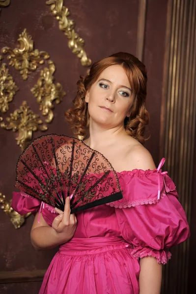 Woman with fan in medieval dress — Stock Photo, Image