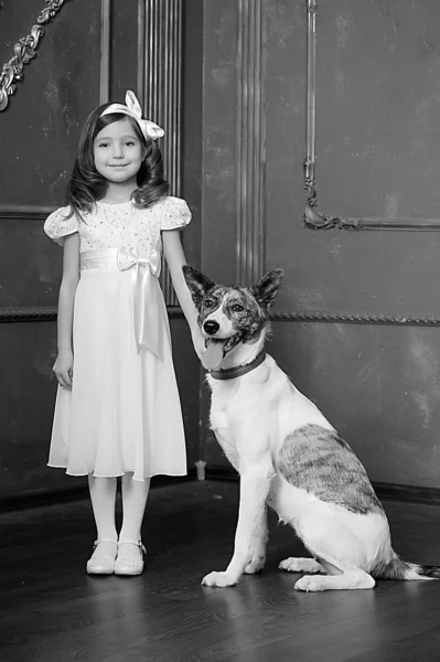 Vintage portrait of a little girl with dog — Stock Photo, Image