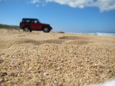 Four wheeler in the sand clipart