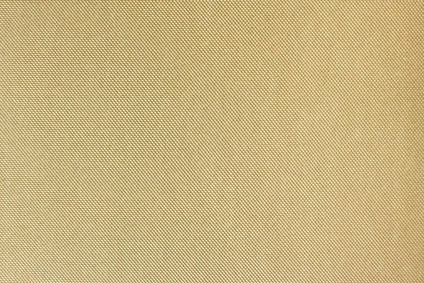 Ткань крупным планом из жёлтой ткани — стоковое фото