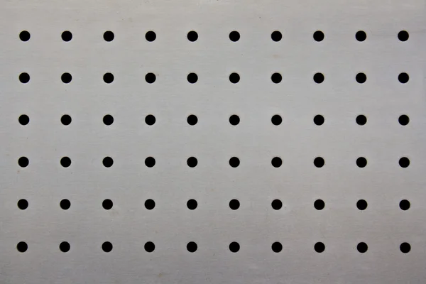 Metal plate with holes — Stock Photo, Image