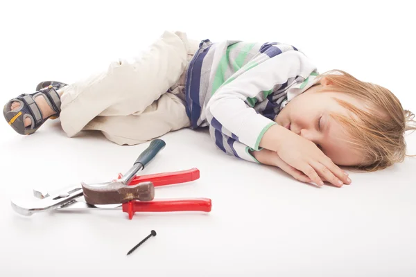Durmiendo chico con martillo y alicates —  Fotos de Stock