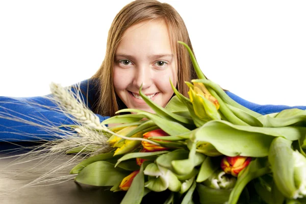 Girl with bouquet of tulips — Stock Photo, Image