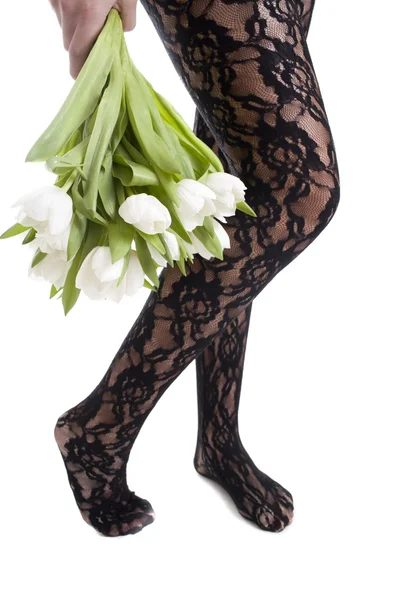 Nő lába és virágok Stock Kép