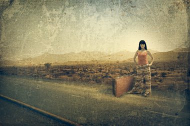 Young woman with suitcase on the road clipart