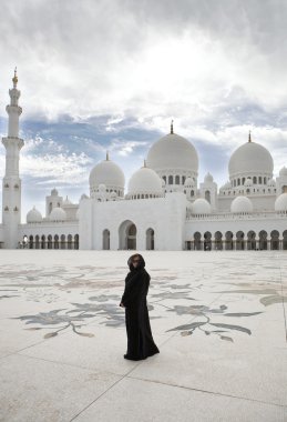 Woman in Sheikh Zayed mosque at Abu Dhabi clipart