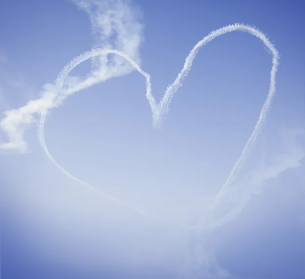 Heart symbol in the blue sky — Stock Photo, Image