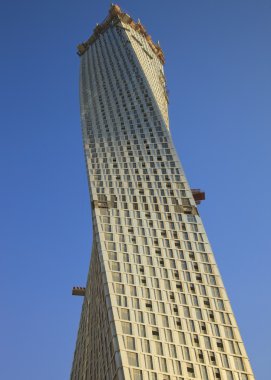 The construction of Infinity tower in Dubai clipart