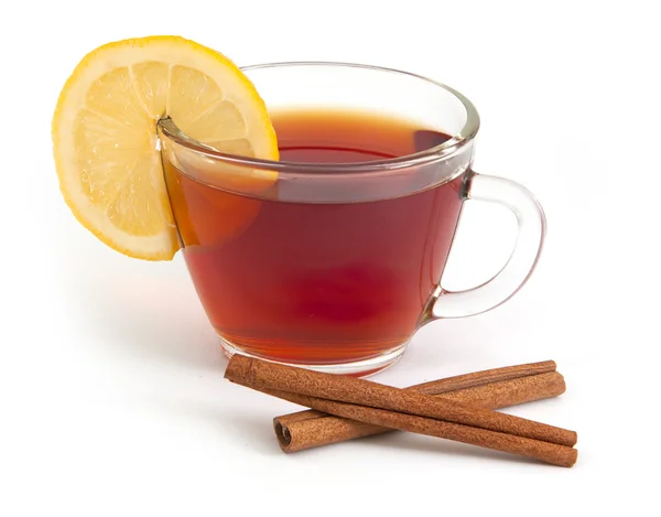 Xícara de chá com limão e canela — Fotografia de Stock