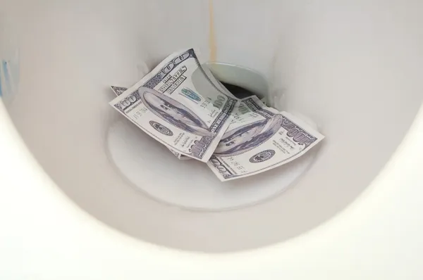 Stock image Fake Money in Water Closet