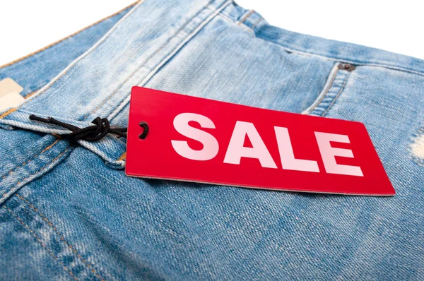 Jeans met verkoop tag — Stockfoto