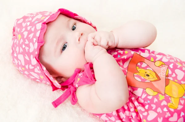 Baby in red clothes — Stock Photo, Image