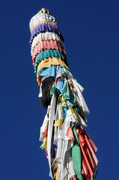 Prayer flags column in Tibet — Stock Photo, Image