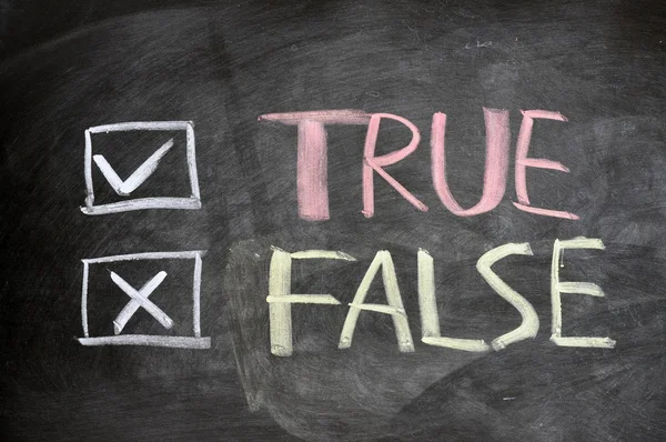 True and false check boxes written on a blackboard — Stock Photo, Image