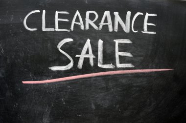 Clearance sale written on a blackboard