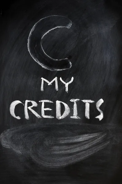 Credits-Zeichen an einer Tafel — Stockfoto