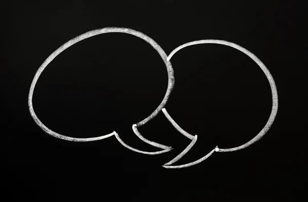 Bir kara tahta üzerinde iki konuşma balonları — Stok fotoğraf