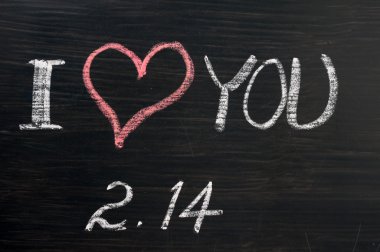 Love with valentine 's date drawn on a chalkboard clipart