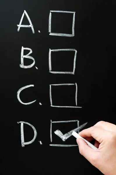 Checkboxes on blackboard — Stock Photo, Image