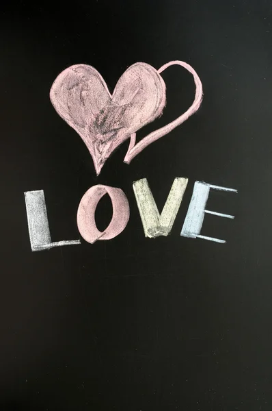 Amor com dois corações desenhados em um quadro — Fotografia de Stock