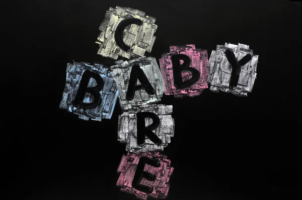 Palavra cruzada de bebê e cuidado — Fotografia de Stock