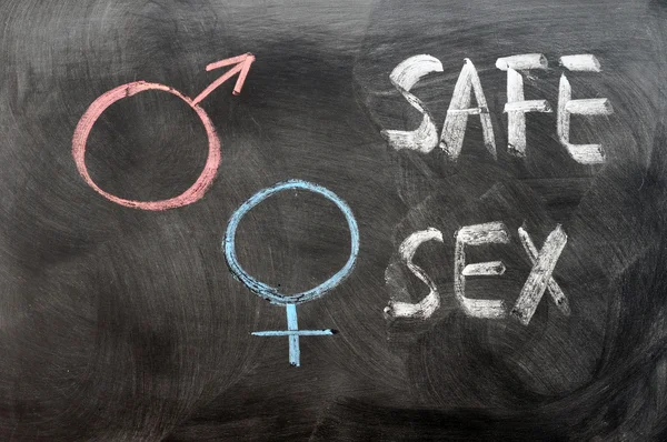 Концепция безопасного секса с гендерными символами — стоковое фото