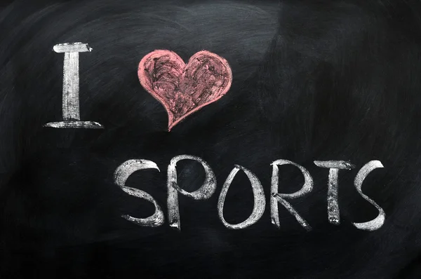 Jeg elsker sport - tekst skrevet på tavlen – stockfoto